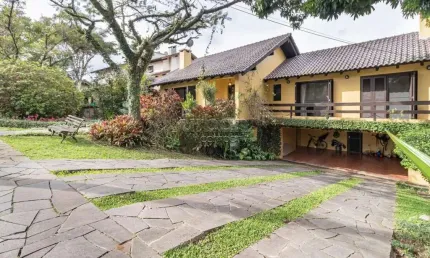 Casa em condomínio fechado com 5 quartos à venda na Avenida Firmino Octávio Bimbi, 255, Cavalhada, Porto Alegre por R$ 1.800.000