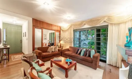 Casa em condomínio fechado com 3 quartos à venda na Rua Eudoro Berlink, 987, Auxiliadora, Porto Alegre por R$ 1.960.000