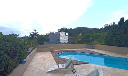 Casa em condomínio fechado com 3 quartos à venda na Estrada Haroldo Soares Glavan, --, Cacupé, Florianópolis por R$ 2.950.000