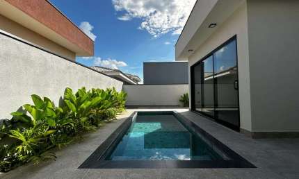Casa de condomínio com 3 suítes e piscina no Condomínio Portal dos Bandeirantes