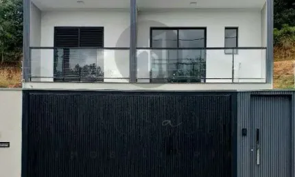 Casa com 3 quartos à venda na Avenida F, 310, Jardim Bandeirantes, Poços de Caldas, 196 m2 por R$ 690.000