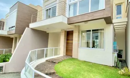 Casa em condomínio fechado com 3 quartos à venda no Cacupé, Florianópolis  por R$ 2.450.000