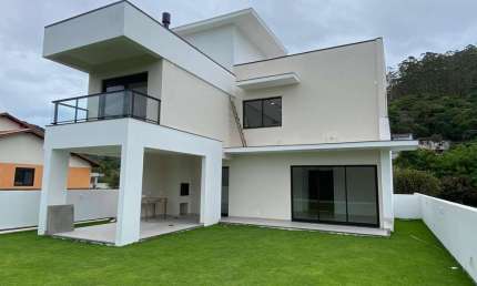 Casa em condomínio fechado com 3 quartos à venda na Rua do Lamim, 2736, Canasvieiras, Florianópolis por R$ 1.950.000