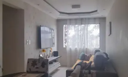 Apartamento venda com 52m², 2 quartos, 1 banheiro, 1 vaga de garagem e armários embutidos.