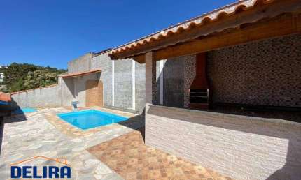 Casa Espaçosa em de Terra Preta, Perfeito  para Família e Entretenimento