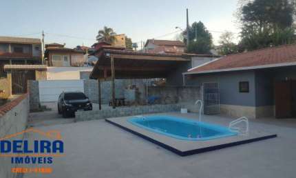 Casa em Terra Preta: Uma Oportunidade Imperdível Esperando por Você!