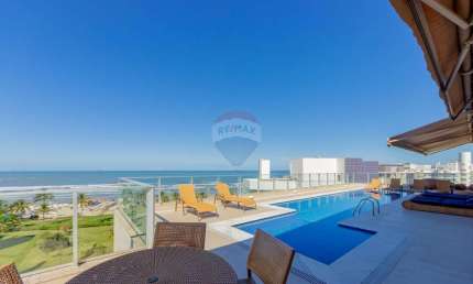 Exclusiva cobertura penthouse pé na areia - Condomínio Riviera de São Lourenço.