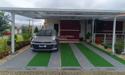 Casa em condomínio fechado com 4 quartos à venda na Avenida Paulo Roberto Vidal, 1455, Bela Vista, Palhoça, 87 m2 por R$ 617.000