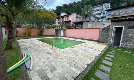 Casa em condomínio fechado com 3 quartos para alugar na Rua Jaime Barcelos, 472, Taquara, Rio de Janeiro
