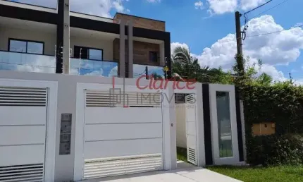 Imperdível: sobrado de 3 suítes no centro de sjp-pr, 160m², 2 salas, 2 vagas, localização privilegiada!