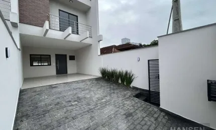 Sobrado com 1 suíte + 2  dormitórios à venda, 132 m² por R$ 875.000 - Costa e Silva - Joinville/SC