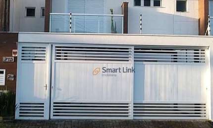 Sobrado com 4 dormitórios à venda, 111 m² por R$ 810.000,00 - Enseada - Bertioga/SP