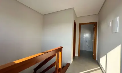 Sobrado Triplex 3 quartos sendo 1 suíte para venda no bairro Centro em Passo de Torres