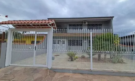 Casa com 3 quartos à venda na Rua Gaspar Martins, Americana, Alvorada