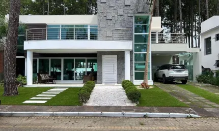 Casa em condomínio para venda no bairro praia de atlântida em xangri-lá