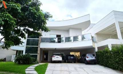 -COP 30 - CASA DE 2 PAVIMENTOS COM 6 SUÍTES + 1 QUARTO + GABINETE NO CONDOMÍNIO ÁGUA CRISTAL! -ÁREA PRIVATIVA: 1.800M². -03 VAGAS DE GARAGEM