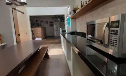 Sobrado com 3 dormitórios à venda, 250 m² por R$ 742.000,00 - Uberaba - Curitiba/PR