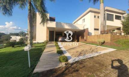 Casa NO CONDOMINIO ROYAL FOREST com 3 dormitórios para alugar, 266 m² por R$ 9,500/mês