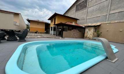 Casa com 4 dormitórios, 300 m² - venda por R$ 1.400.000,00 ou aluguel por R$ 10.000,00/mês - Parque Hotel - Araruama/RJ