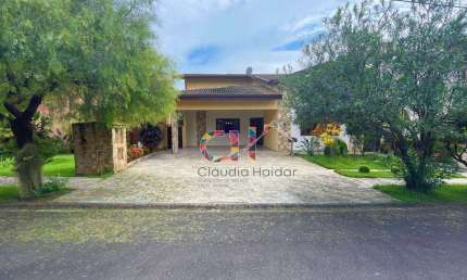 Casa com 3 dormitórios à venda, 335 m² por R$ 1.600.000,00 - Condomínio Residencial Terras do Caribe - Valinhos/SP