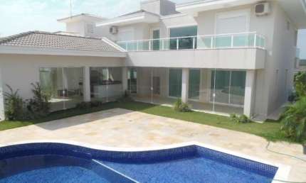 Casa em condomínio fechado Portal do Paraíso II, permuta, aquecimento solar, planejados, piscina.