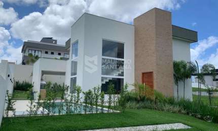 Casa com 4 suítes, sendo uma térrea em condomínio - Camaçari