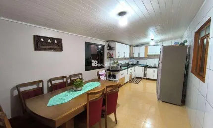 Casa com 4 quartos na área central de Santa Tereza do Oeste