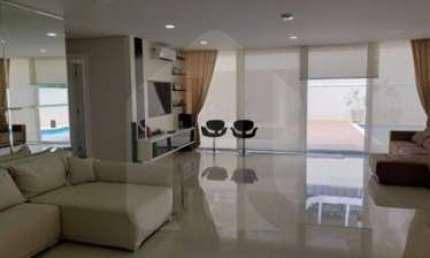 Casa de condomínio fechado Alphaville 12 com 4 suítes à venda