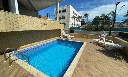 Casa em condomínio na Praia do Morro com 3 quartos, área de churrasqueira e piscina.