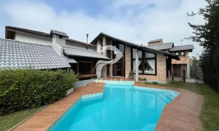 Casa em condomínio fechado com 4 quartos à venda na Ezio Renato João Mora (rua 77), --, Jardim Acapulco, Guarujá por R$ 2.250.000