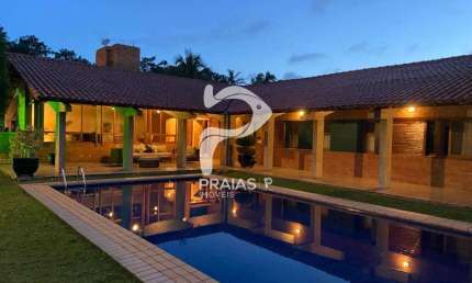Casa em condomínio fechado com 4 quartos à venda na Comendador José Berloffe (rua 10), --, Jardim Acapulco, Guarujá por R$ 2.900.000