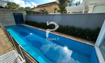 Casa em condomínio fechado com 4 quartos à venda na Benedito Lauro de Camargo (rua 82), --, Jardim Acapulco, Guarujá por R$ 3.000.000