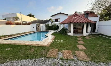 Casa em condomínio fechado com 4 quartos à venda na Nicolau Vitiello (rua 45), --, Jardim Acapulco, Guarujá por R$ 1.600.000