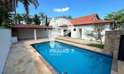 Casa em condomínio fechado com 4 quartos à venda na Rua Vinte, --, Jardim Acapulco, Guarujá por R$ 1.500.000