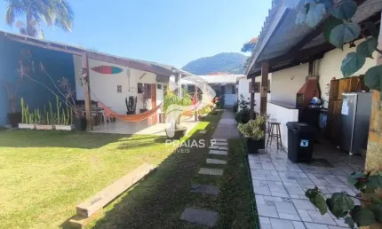Casa com 6 quartos à venda na antônio dos santos coelho júnior, --, jardim guaiuba, guarujá por r$ 1.200.000