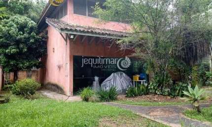 Casa em condomínio fechado com 1 quarto à venda no Balneário Praia do Pernambuco, Guarujá  por R$ 550.000