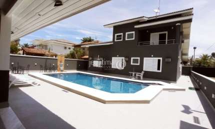 Casa em condomínio fechado com 5 quartos à venda no Jardim Acapulco, Guarujá  por R$ 3.600.000