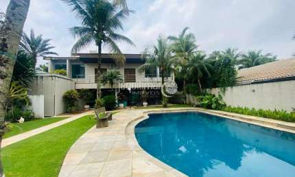 Casa em condomínio fechado com 5 quartos para alugar no Jardim Acapulco, Guarujá  por R$ 15.000