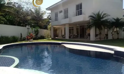 Casa em condomínio fechado com 5 quartos à venda no Jardim Acapulco, Guarujá  por R$ 2.800.000