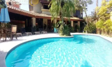 Casa em condomínio fechado com 4 quartos à venda no Jardim Acapulco, Guarujá  por R$ 2.900.000