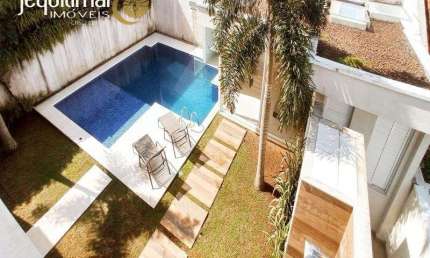 Casa em condomínio fechado com 5 quartos à venda no Jardim Acapulco, Guarujá  por R$ 3.800.000