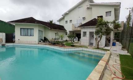 Casa em condomínio fechado com 5 quartos à venda no Jardim Acapulco, Guarujá  por R$ 3.600.000