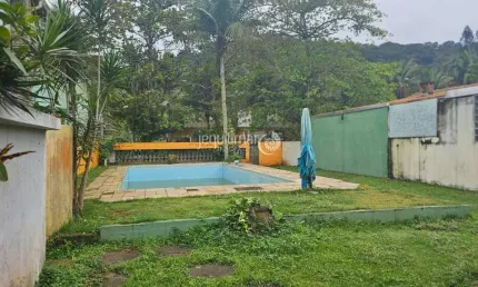 Casa em condomínio fechado com 1 quarto à venda no Balneário Praia do Pernambuco, Guarujá  por R$ 650.000