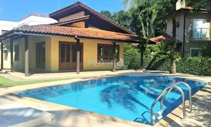 Casa em condomínio fechado com 3 quartos para alugar no Balneário Praia do Pernambuco, Guarujá  por R$ 8.500