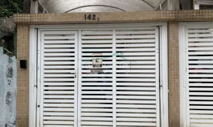 Casa com 4 quartos à venda na Rua Paraná, Vila Mathias, Santos