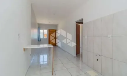 Casa em condomínio fechado a venda no bairro Ponta Grossa em Porto Alegre.
