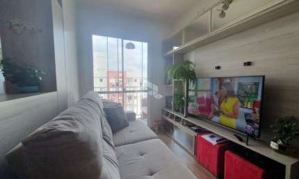 Apartamento com 2 dormitórios 1 vaga e semi mobiliado