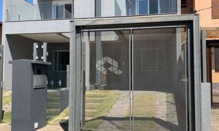 Casa de 3 dormitórios, suíte e 2 vagas para venda no bairro Guarujá!!!