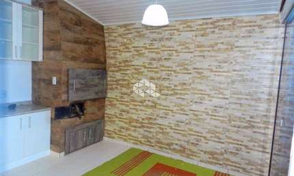 Casa em Condomínio 3 dormitórios, semimobiliado, 1 vaga de garagem, Marechal Rondon, próximo ao parkshopping Canoas, aceita financiamento e FGTS.