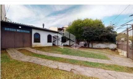 Casa com 4 quartos à venda na Avenida Guarujá, 136, Guarujá, Porto Alegre